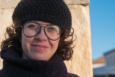 Portrait of smiling woman wearing hat