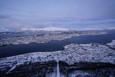 Scenic view of frozen lake against sky