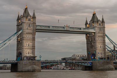 View of bridge over river in city