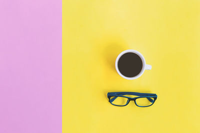 Directly above shot of coffee cup on table