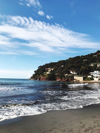 Scenic view of beach against sky