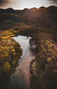 High angle view of lake against sky during sunset