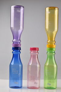 Close-up of wineglass against white background