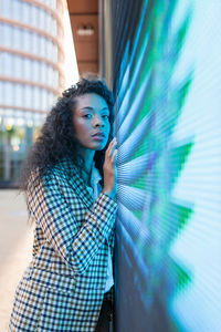 Portrait of a young woman looking away