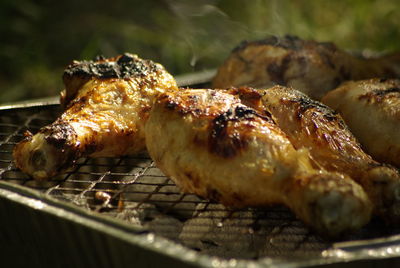 Close-up of meat on barbecue grill