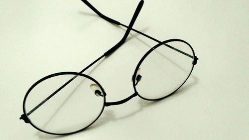 Close-up of eyeglasses on table