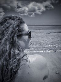 Rear view of woman at beach 