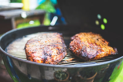 Close-up of meat on barbecue grill