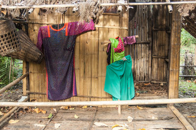 Clothes drying on clothesline against building