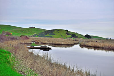 Scenic view of land against sky