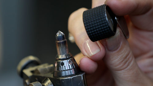 Close-up of hand holding key