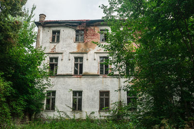 Low angle view of old building against sky