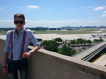 Portrait of young man in sunglasses