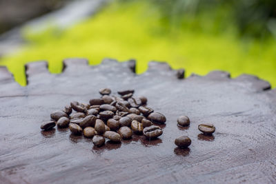 Close-up of coffee beans on table