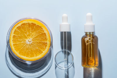 Close-up of bottles against white background