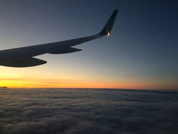 Aerial view of aircraft wing in sky