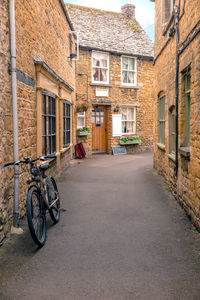 Bicycles parked on street outside house