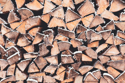 Full frame shot of logs during winter