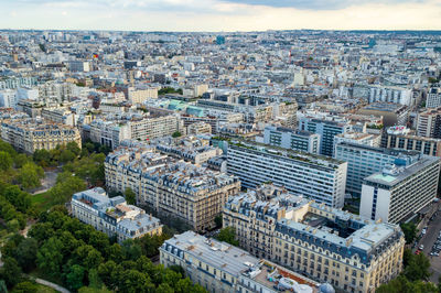 Aerial city landscape of paris, lots of roofs characteristic roofs and chimney