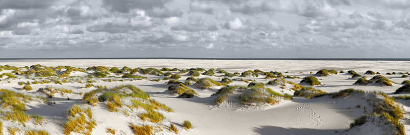 Scenic view of sea against sky during winter