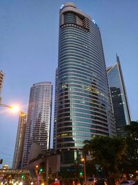 Low angle view of modern buildings against clear sky