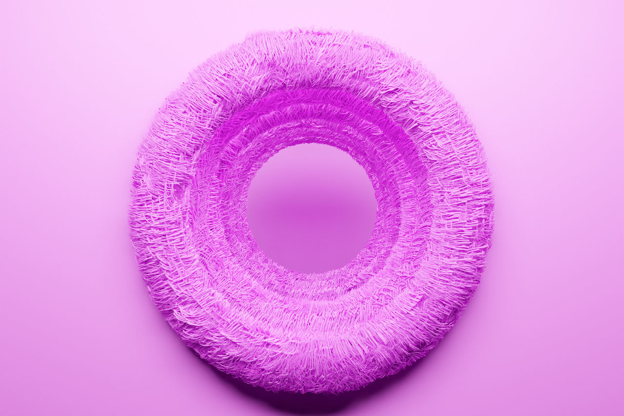 CLOSE-UP OF PINK SPIRAL