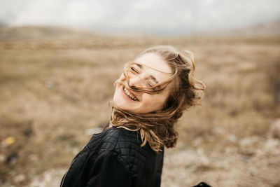 Portrait of smiling young woman