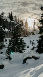 Scenic view of snow covered mountains against sky