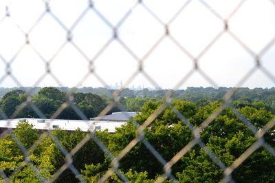 Fence seen through chainlink fence