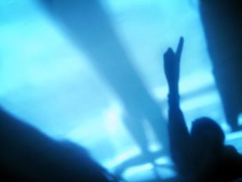 View of people in dark room