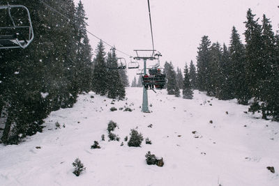 Ski lift against sky