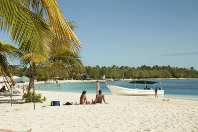 Scenic view of beach against clear sky