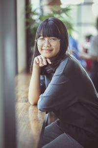 Portrait of a smiling young woman