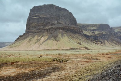 Scenic view of rock formations against sky