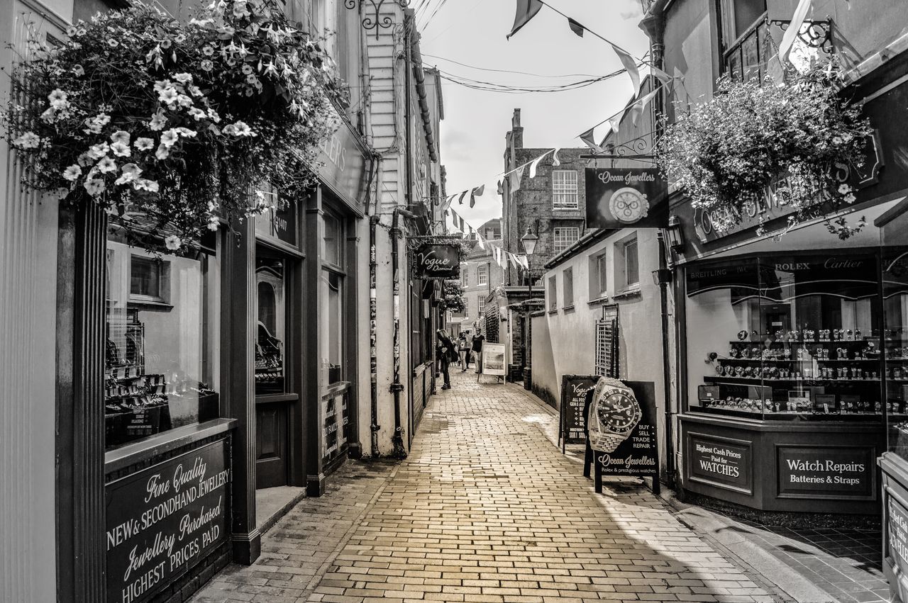 NARROW STREET LEADING TOWARDS BUILDINGS