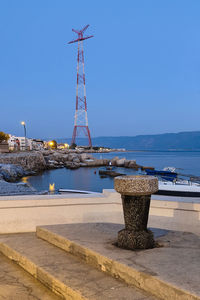 View of harbor against blue sky