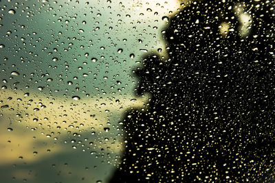 Close-up of water drops on glass