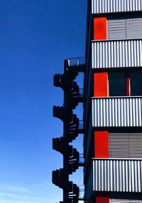 Low angle view of building against clear blue sky