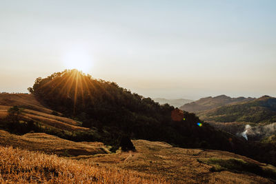 Scenic view of mountains against sky during sunset
