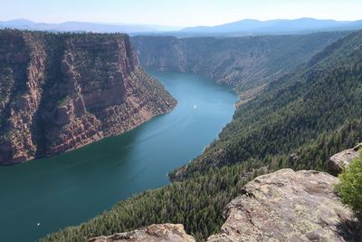 High angle view of river amidst mountains