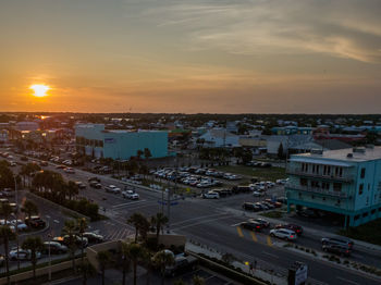 High angle view of buildings against sky during sunset