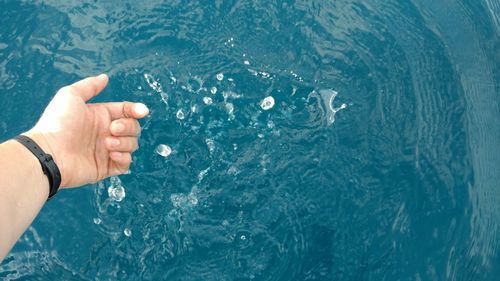 Close-up of hand in water