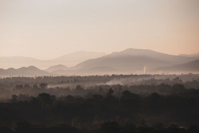 Scenic view of mountains against sky during sunset