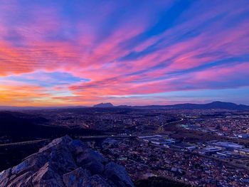 Scenic view of mountains against sky during sunset