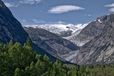 Scenic view of nigardsbreen against sky