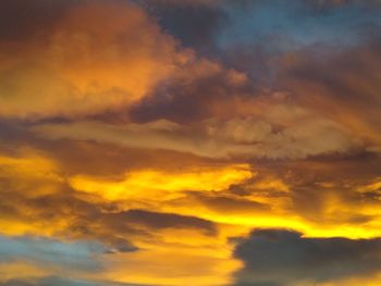 Low angle view of orange cloudy sky