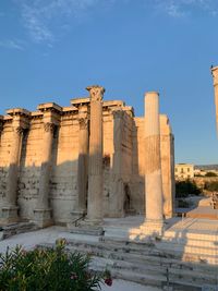 Low angle view of historical building against blue sky