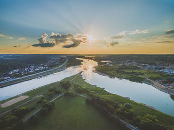 Sun shining through trees