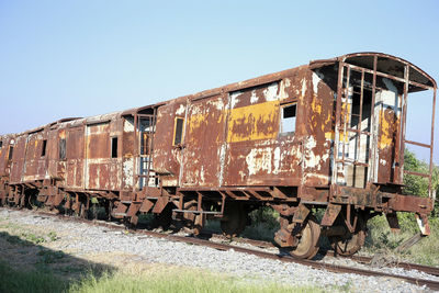 Abandoned train against sky
