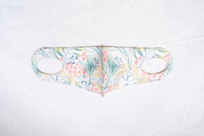 High angle view of multi colored pattern on white background